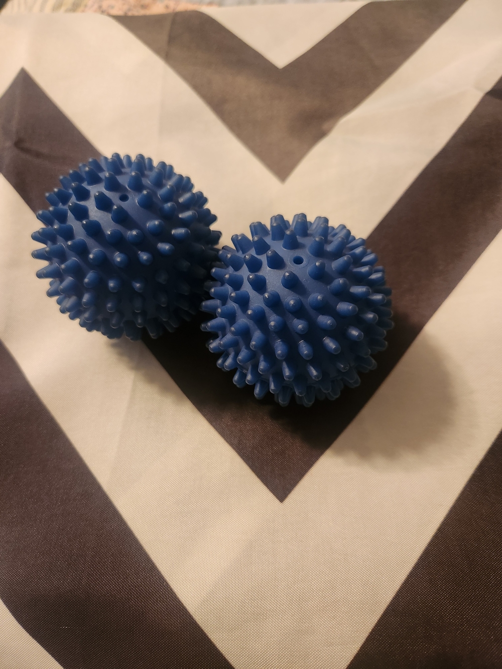 Set of Two Blue Spiky Massage Laundry Balls and Chevron Shower Curtain